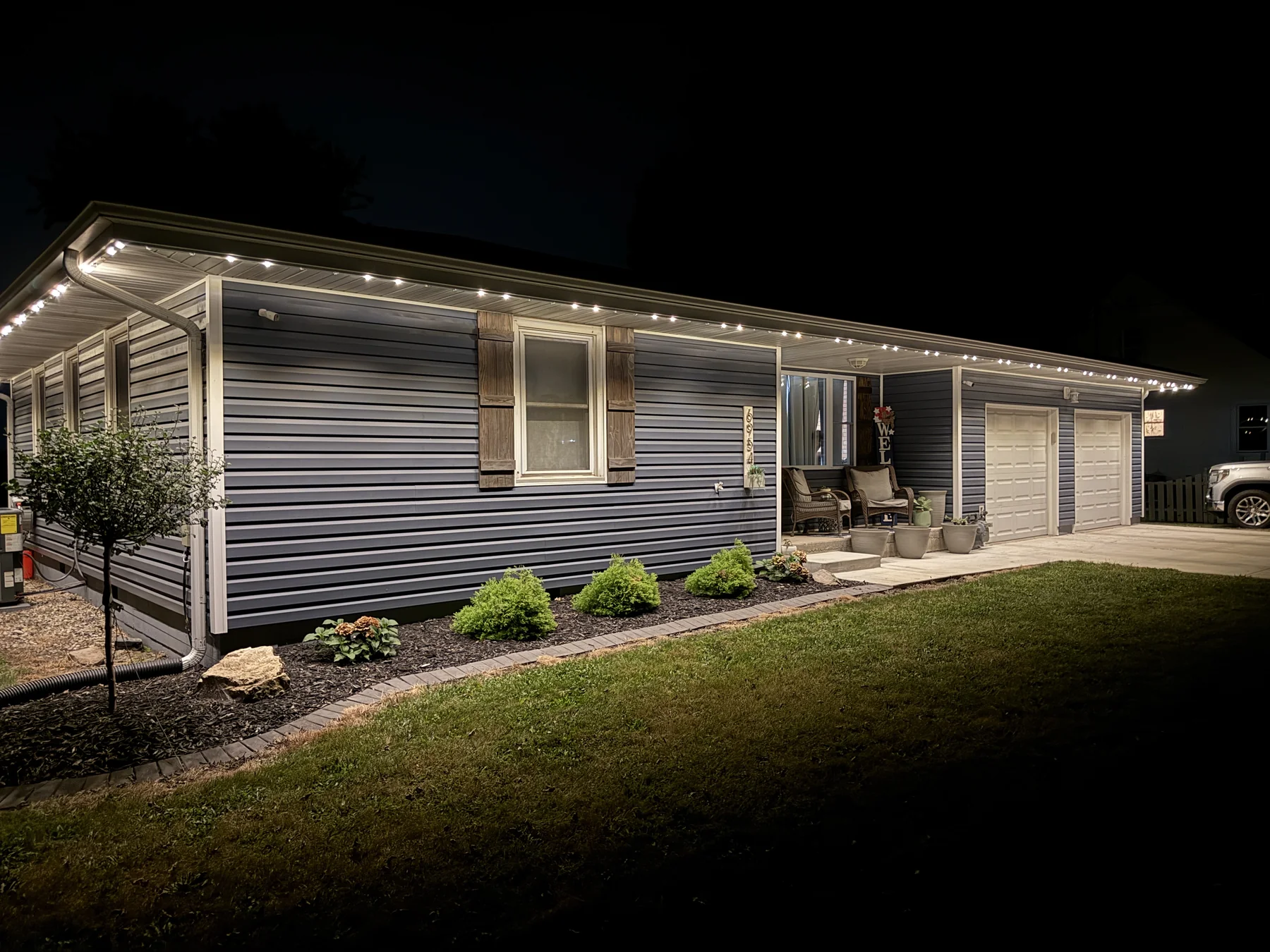 Warm-white permanent lighting used for property security and visibility